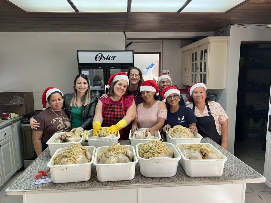 The Acton Academy El Salvador kitchen team with the day's homemade bread