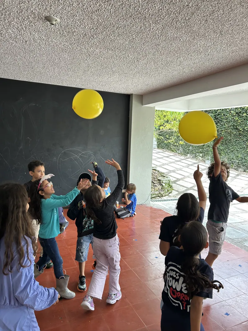 Learners playing together inside the studio