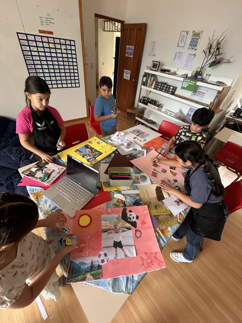 Learners spread across the studio floor working on a quest